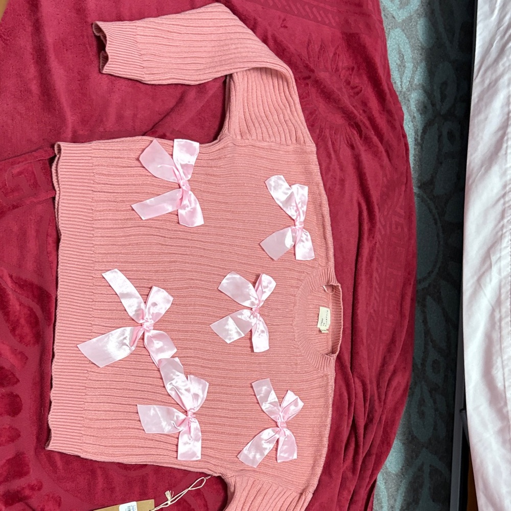 Pink Sweater with Bow Accents